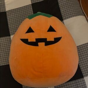Squishmallow jack-o’-lantern pumpkin